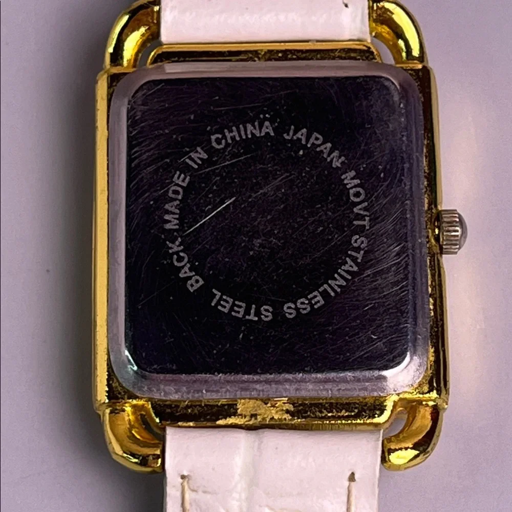 Cote d'Azur Gold and White Watch w/ floating numbers- Not Tested